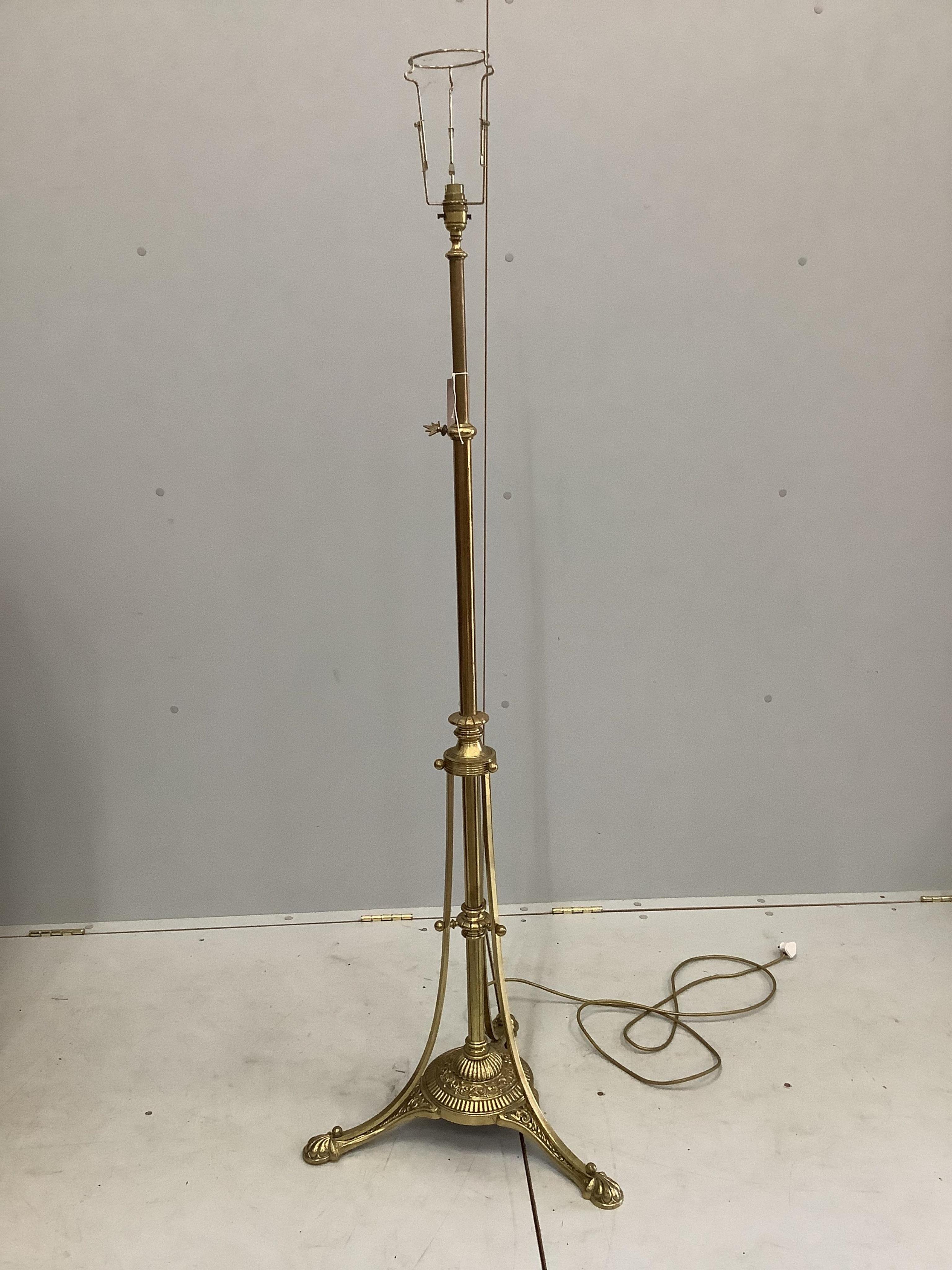 A late Victorian brass telescopic standard lamp. Condition - good